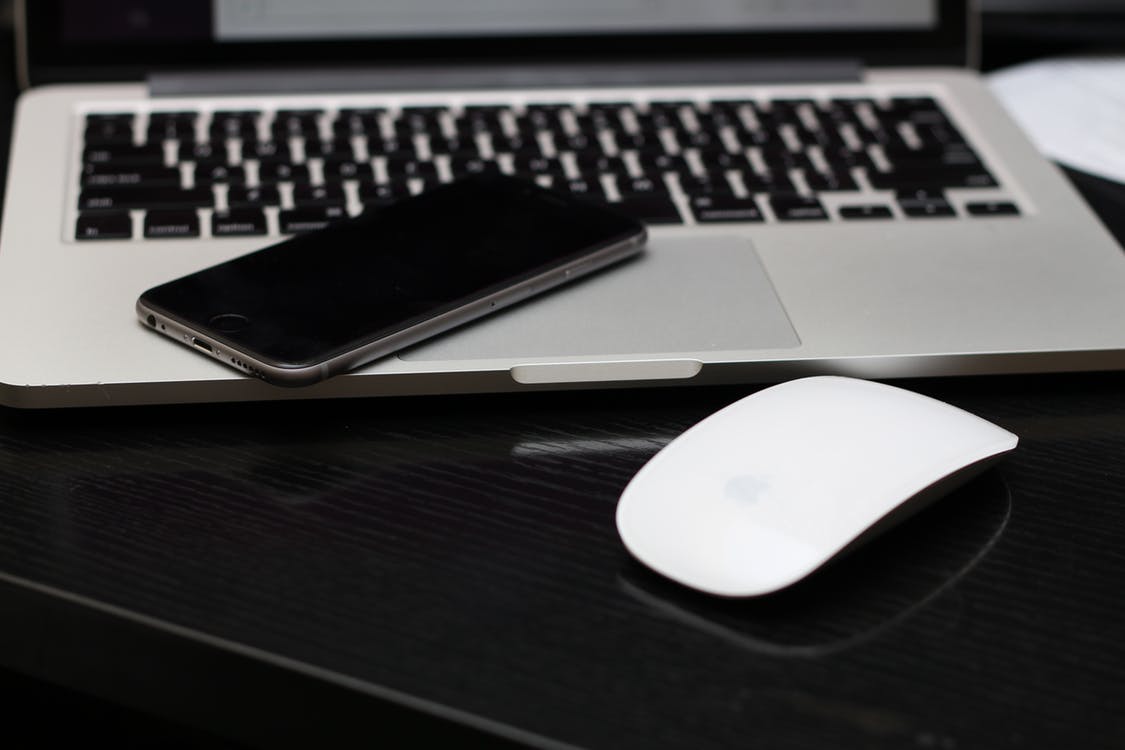 Apple wireless mouse, iPhone, macbook pro.